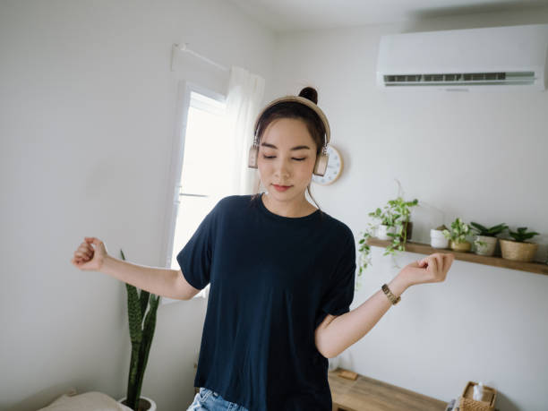 istock Young woman dancing in the bedroom. 1263904244