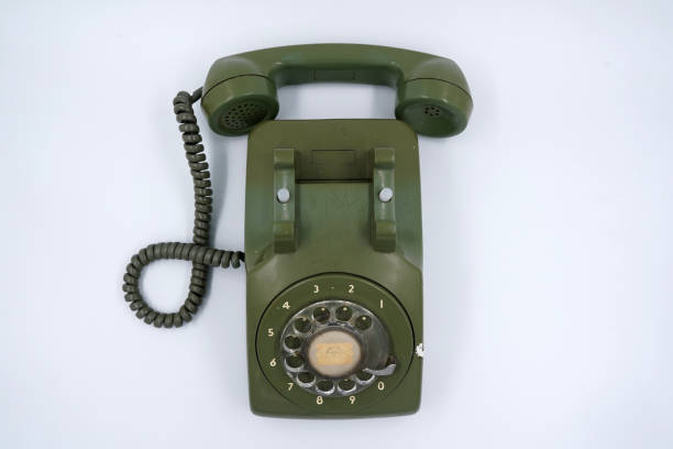 istock Old and dirty green phone, isolated background 1263904354
