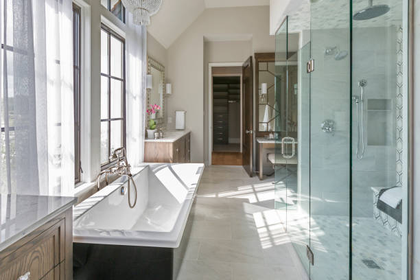 istock Two toned free standing bathtub in new master suite 1263907639