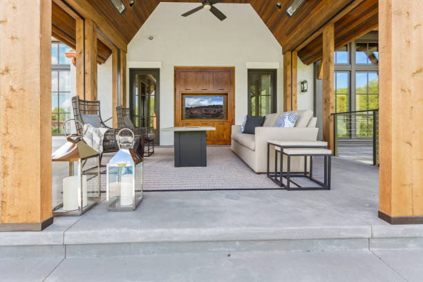 Huge covered back patio with vaulted ceiling Gorgeous wood beams and ceiling with plenty protection from the elements for comfortable outdoor living patio cover stock pictures, royalty-free photos & images