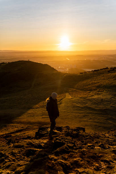 istock Backpacker in mountains at sunrise 1263908179