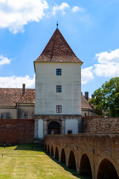 The famous Nadasdy Castle In Sarvar, Hungary with the brick bridge.
