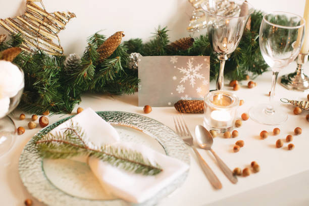 istock Table setting for Christmas and New Year in warm colors. Festive dinner. Postcard copy space. 1263912448