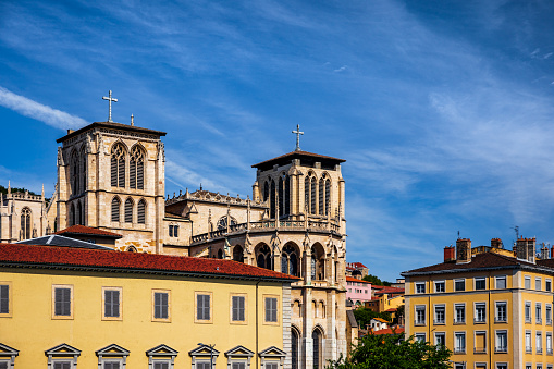 Majestic ancient architecture of Saint-Jean-Baptiste Cathedral monument in Lyon old town, in Vieux Lyon district. Photo taken in Lyon famous city, Unesco World Heritage Site, in Rhone department, Auvergne-Rhone-Alpes region in France, Europe during a sunny summer day.