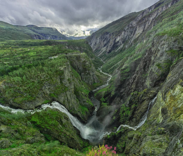 istock Beautiful waterfall in the mountains in Norway. 1263913845