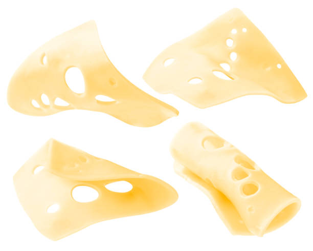 satz von käsestücken, die auf weißem hintergrund in der luft fliegen. levitating cheese - maasdam stock-fotos und bilder