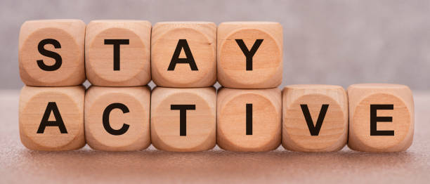 istock stay active printed on wooden cubes 1263917385