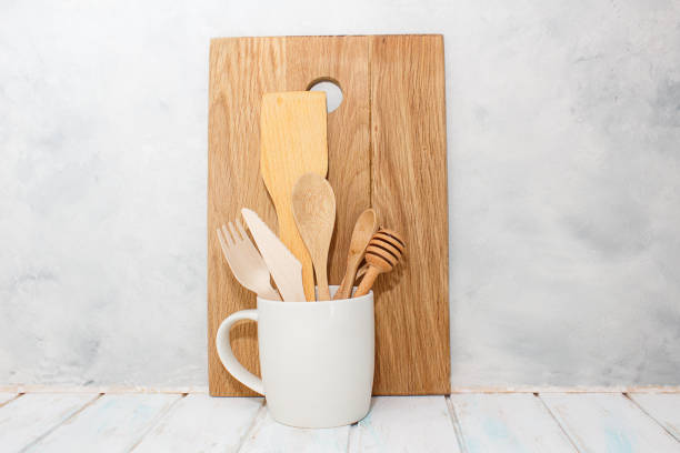 istock Kitchen wooden spoons in white cup 1263922601