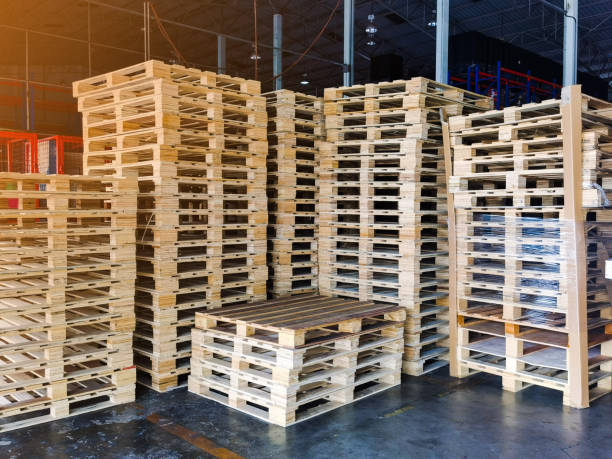istock Wooden pallets stack at the freight cargo warehouse storage for shipment box container in transportation and logistics industrial 1263923854