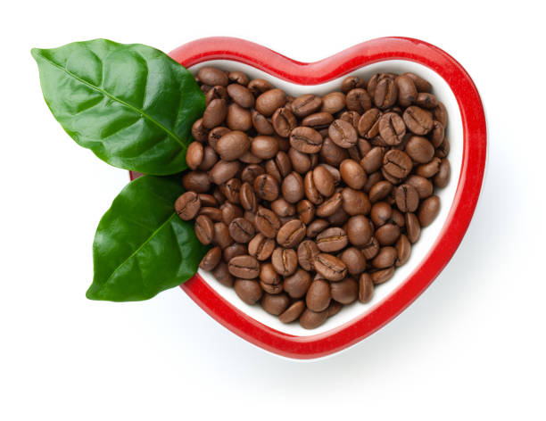 istock Coffee Beans In Heart Shaped Bowl Isolated 1263925648