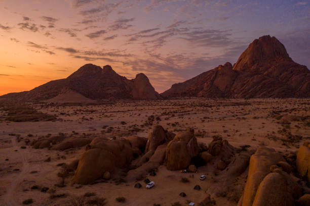 istock Sun setting over arid landscape, Spitzkoppe, Namibia, Africa 1263928205
