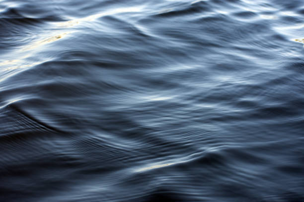 istock Dark Blue waves of water. 1263929111