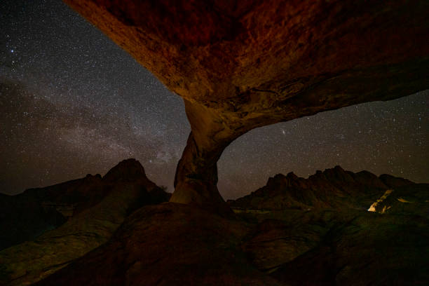 istock Night sky and natural arch, Spitzkoppe, Namibia, Africa 1263929401