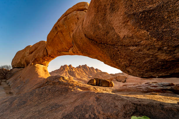 istock Natural arch rock formation in desert, Spitzkoppe, Namibia, Africa 1263929451