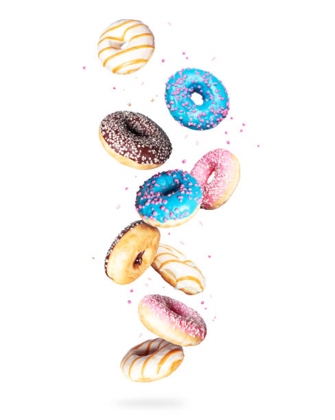 istock Various donuts in the air on a white background 1263930381