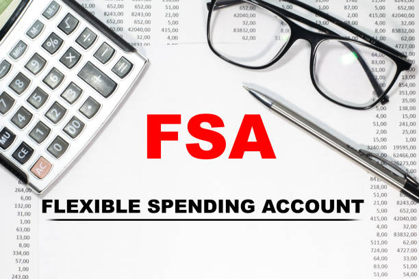 Paper with Flexible Spending Account FSA on a table Paper with Flexible Spending Account FSA on a table free syrian army stock pictures, royalty-free photos & images