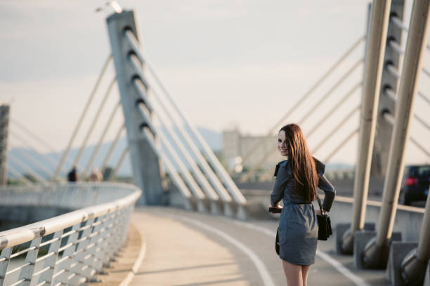 istock Woman on electric push scooter 1263933220