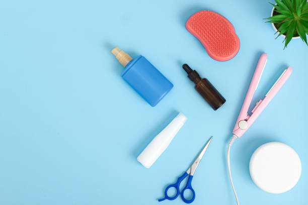 istock Hairdresser tools on blue background with copy space 1263935591