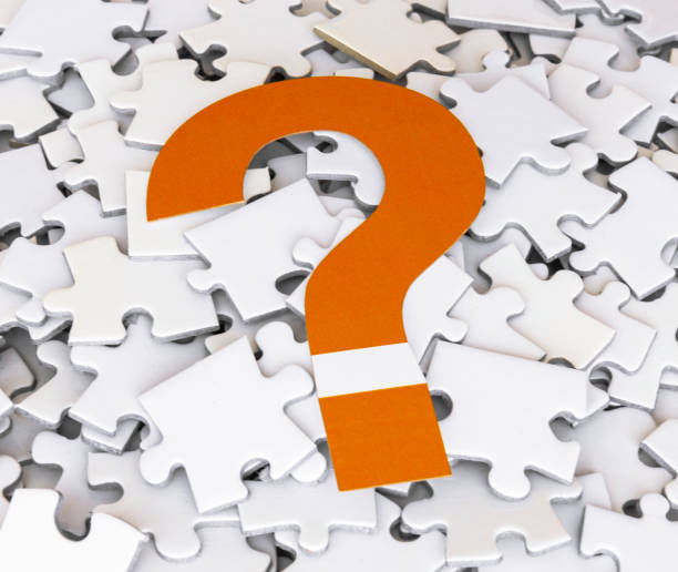 istock Question Mark and Puzzle Pieces 1263940750