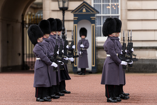 London, United Kingdom - June 29, 2010 : Queens Guards marching towards Buckingham Palace