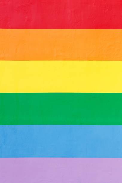 istock Painted wall texture with LGBT colors 1263944489