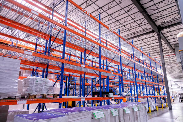 istock Huge warehouse void shelves. Graphic printing industry. 1263945315