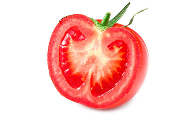 istock half of a tomato isolated on white background 1263946255