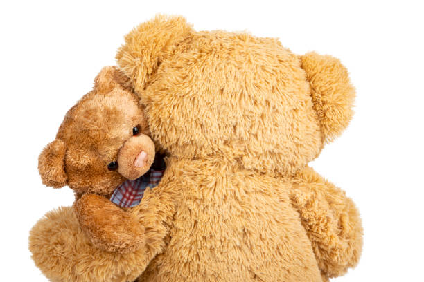istock Teddy bear with little bear in on white background. 1263946271