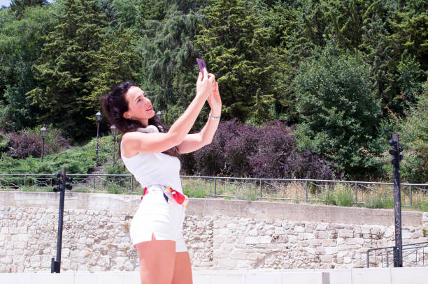 istock Woman taking a selfie 1263946499