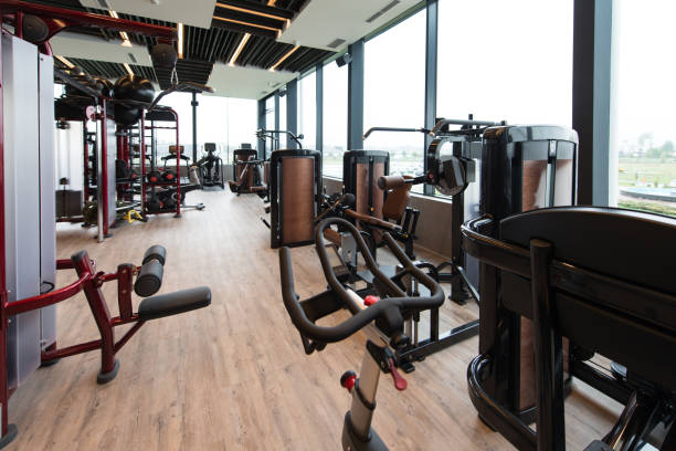istock Large Modern Gym With Workout Equipment 1263965638