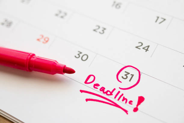 istock Deadline write on white calendar page date close up 1263965840