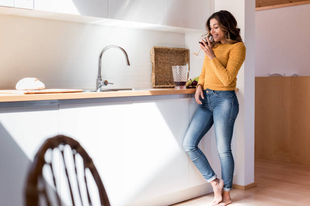 istock Beautiful woman drinking wine 1263972028