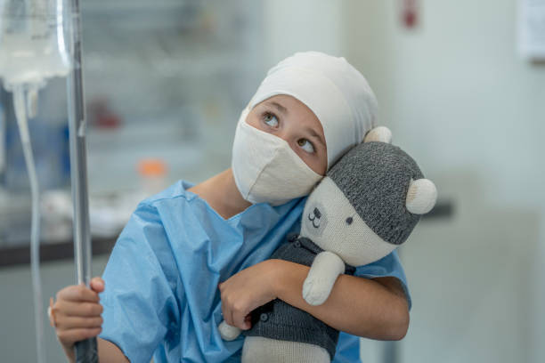 istock Young female oncology patient wearing mask 1263972361