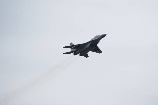 istock A twin-engine jet fighter aircraft in flight 1263977634