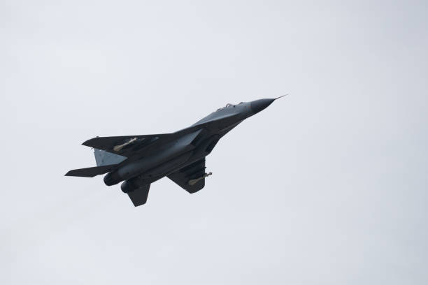 istock A twin-engine jet fighter aircraft in flight 1263977638
