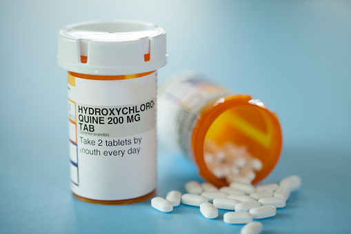 Hydroxychloroquine Medicine Isolated on Blue
