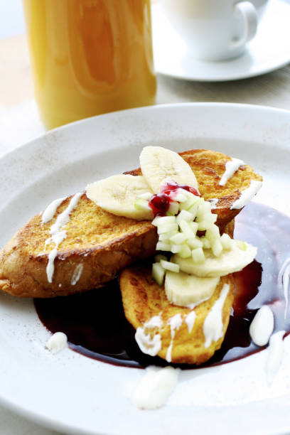 French toast with banana and raspberry sauce