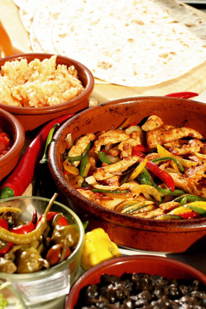 istock Stir fried Mexican chicken with pepper strips 1263978651