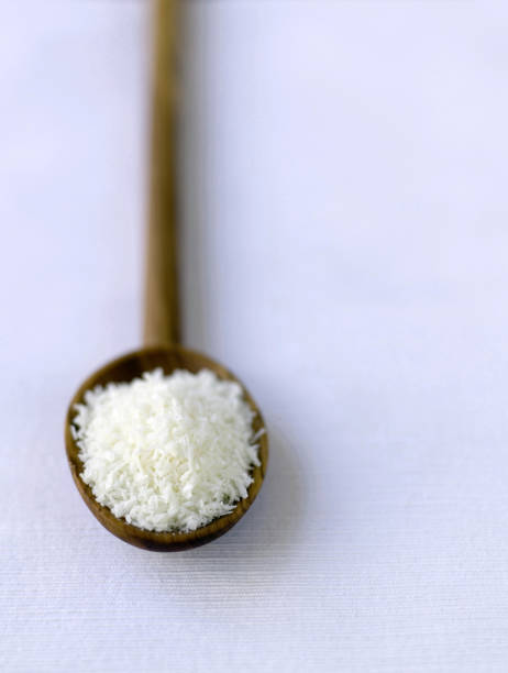 istock Desiccated coconut in spoon 1263980788
