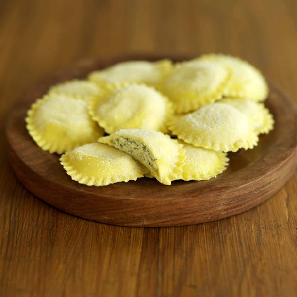 istock Fresh tortellini pasta on wooden board 1263981931