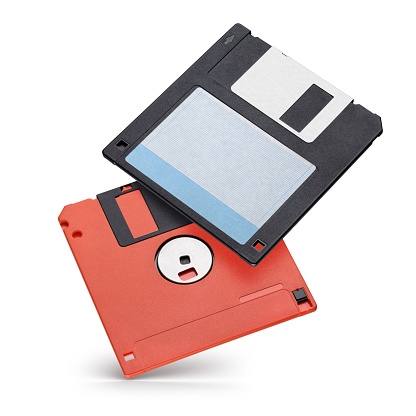 Two 3.5-inch floppy disk or diskette isolated on white background