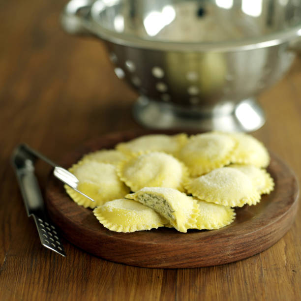 istock Fresh tortellini pasta on wooden board 1263990693