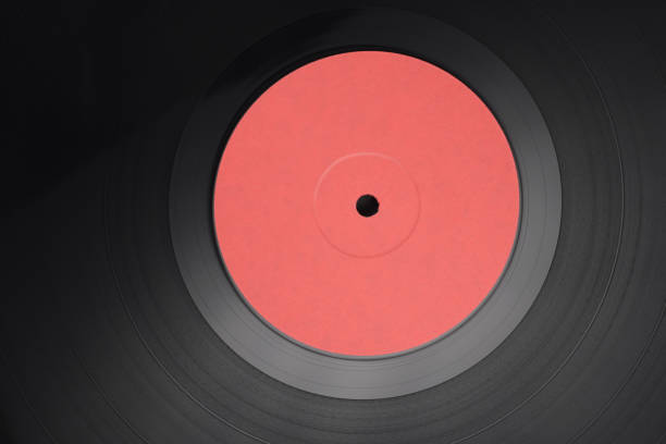 istock 12-inch LP vinyl record disk with blank red label. 1263993507