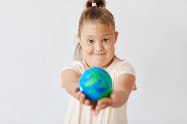 istock Down syndrome girl 1263995613