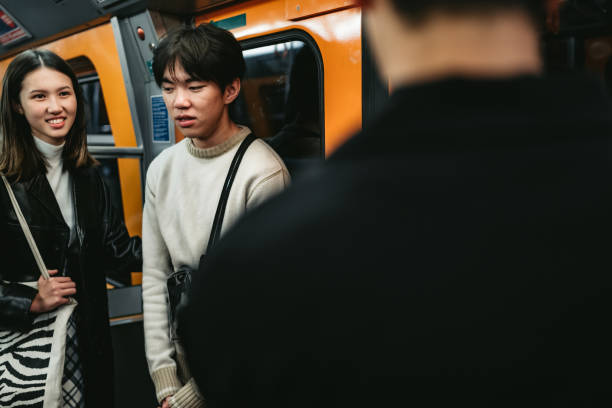 istock Teenagers in subway train 1263996364