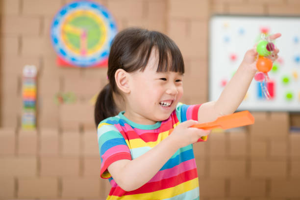 istock young girl plays magical magnet experiments at home for home schooling 1264000179