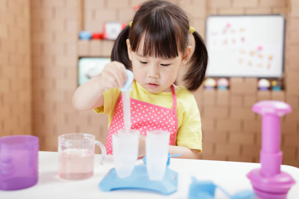 istock young girl making ice lolly for home schooling 1264000201
