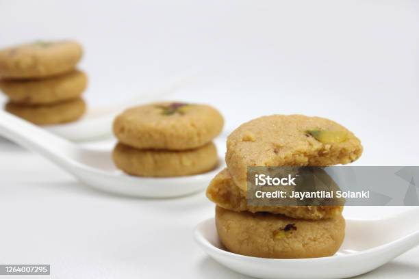 Sweet Milk Peda With Pistachio Garnishing Is Traditional Indian Sweet Stock Photo - Download Image Now