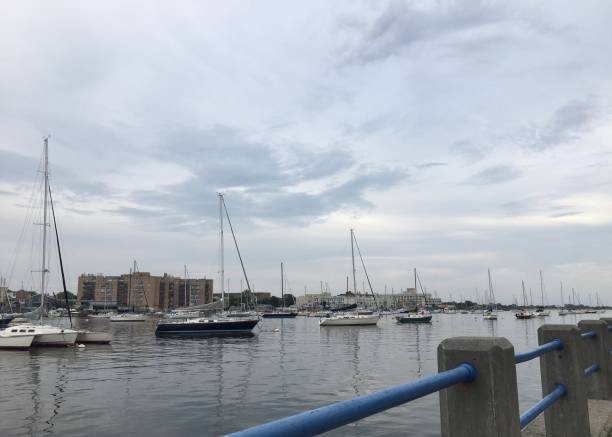 istock Cloudy Sunset in August at Sheepshead Bay in Brooklyn, New York, NY. 1264009866