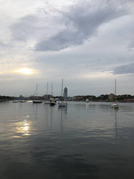 istock Cloudy Sunset in August at Sheepshead Bay in Brooklyn, New York, NY. 1264009904